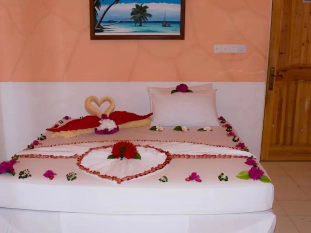 Rasdhoo Island Inn · On the designated beach · sunset side