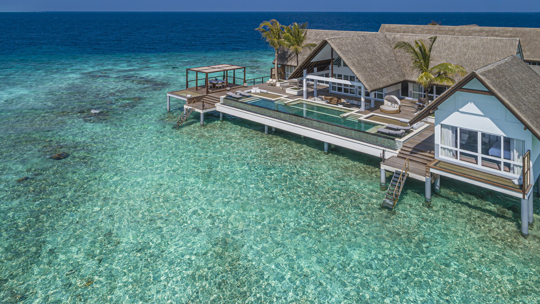 Sunrise Three-Bedroom Water Suite · Three bedrooms · sunrise over-water