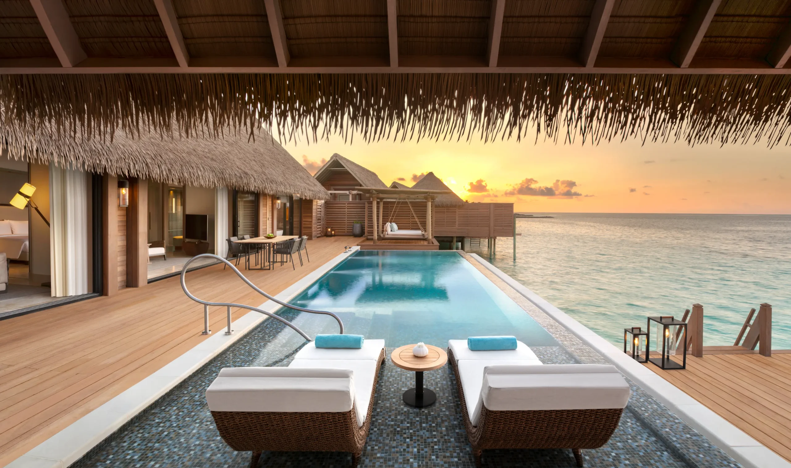 King Grand Reef · pool at sunset